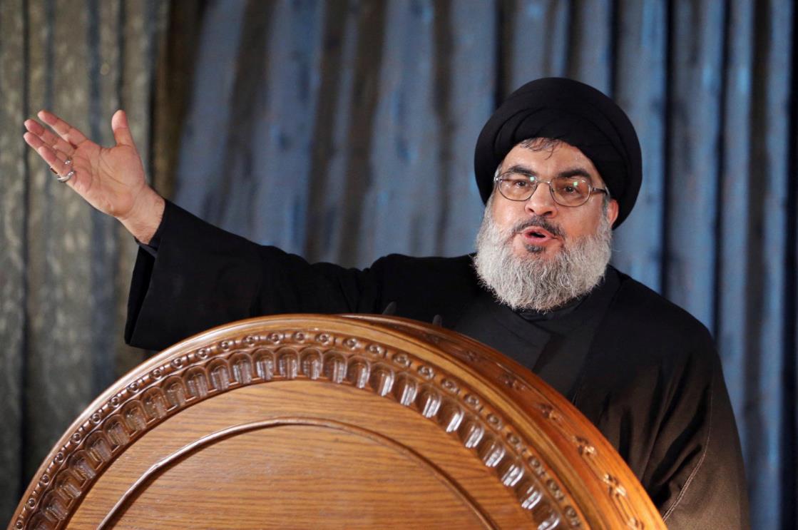 Lebanon&#039;s Hezbollah leader Sayyed Hassan Nasrallah gestures as he addresses his supporters in a rare public appearance during a religious ceremony on the eve of Ashura in Beirut&amp;#039;s southern suburbs, Nov. 13, 2013. (Reuters File Photo)